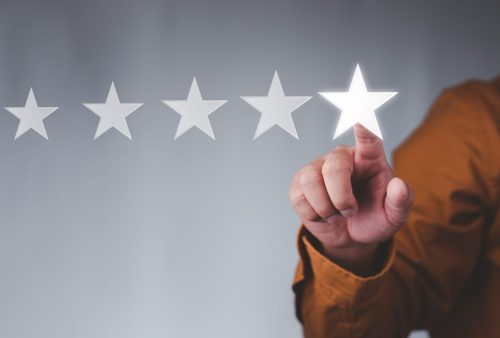 Customer service experience and business satisfaction survey, businessman touching with a screen Five stars (5) rating, Feedback, review and rating concepts.