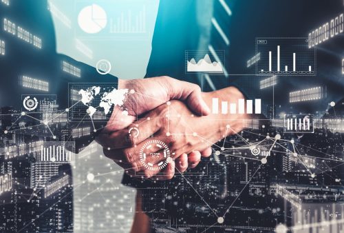 Imaginative visual business handshake with computer graphic of investment data